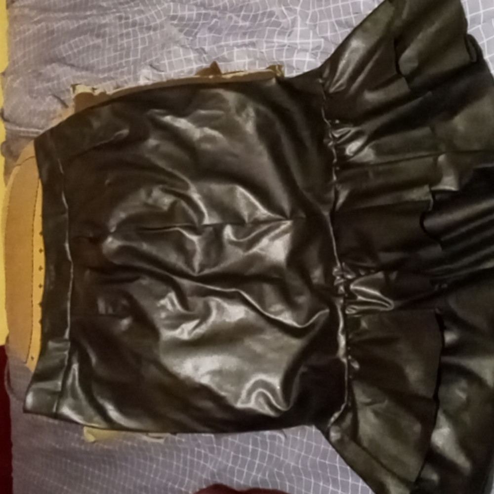 Leather look like black ruffle skirt
